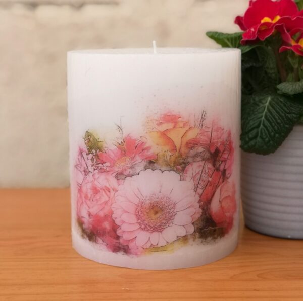 Large pillar candle with picture of pink flowers bunch