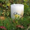 Pillar candle with a Blue Tit picture.