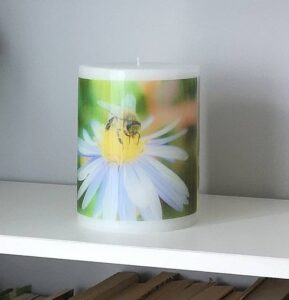 Candle with photo of bee