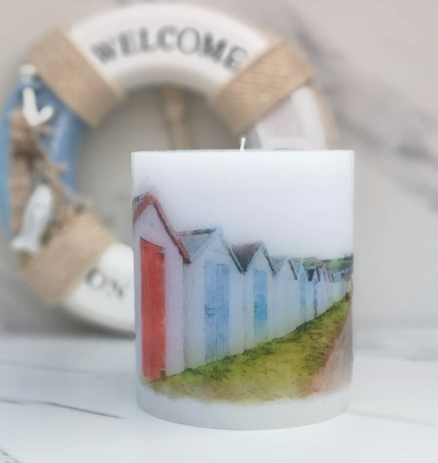 Candle with picture of beach huts
