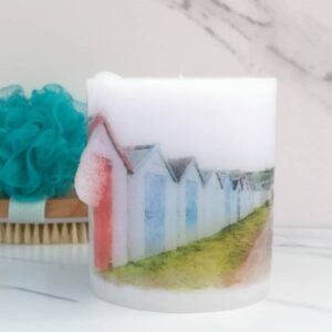 Pillar candle with a picture of Beach Huts.