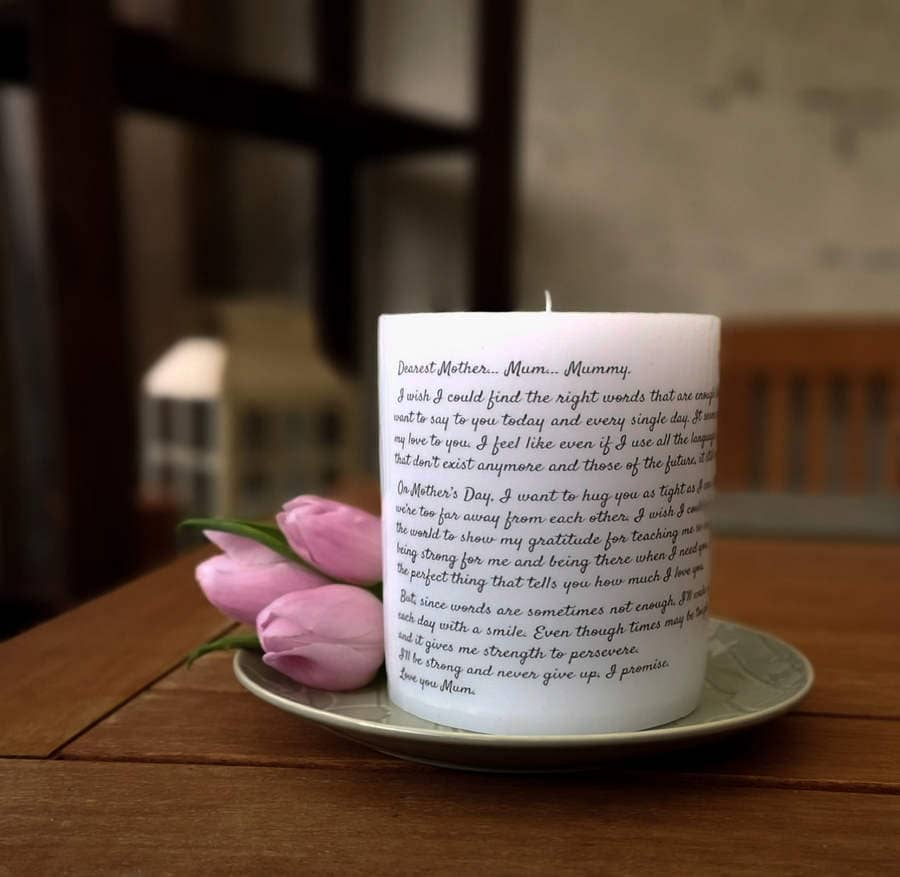 Big candle with long text on it