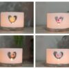 Four small wax lanterns with different colour Fimo beads
