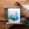 Pillar candle with a Peacock picture.
