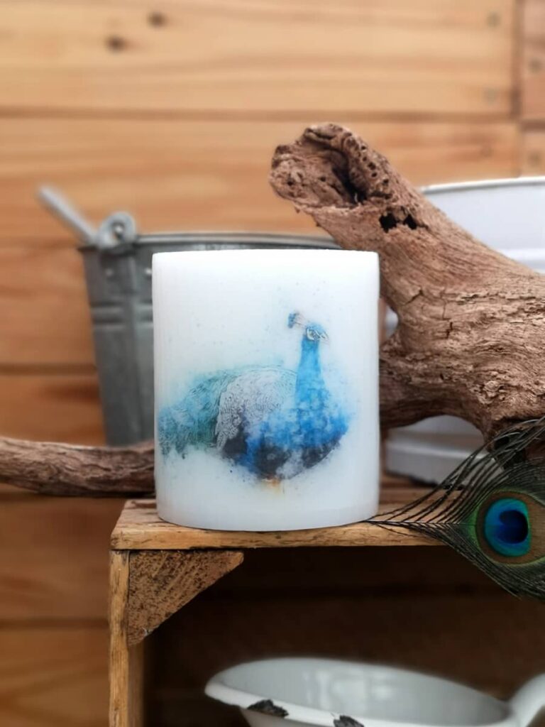 Candle with picture of peacock