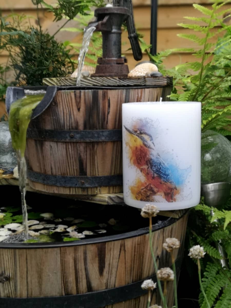 Pillar candle with a Kingfisher picture.