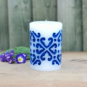 Hand-carved candle and hand-painted with blue wax medium pillar candle.
