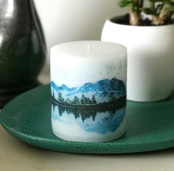 Pillar candle with a picture of Mountain Lake.