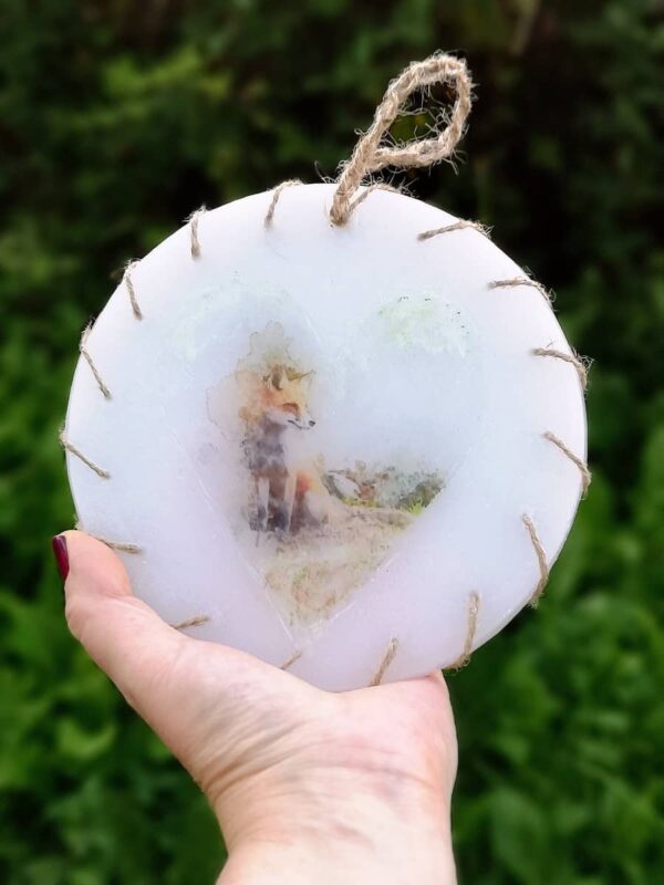 Wax ornament with a picture of Fox .