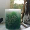 Pillar candle with a picture of Lily of the Valley