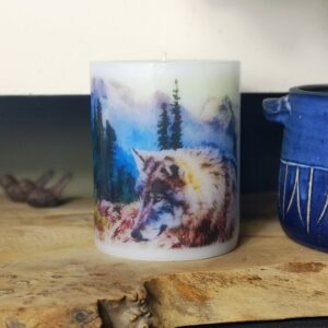 Pillar candle with a wolf image.