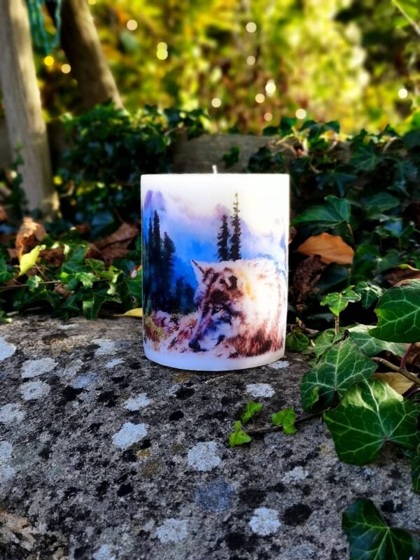 Pillar candle with a picture of Wolf.