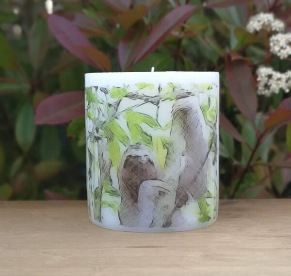 Pillar candle with a picture of a sloth.