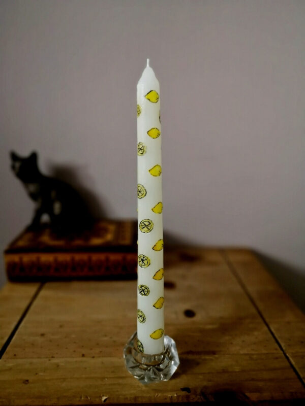 The one of 3 taper candles with lemon pattern.