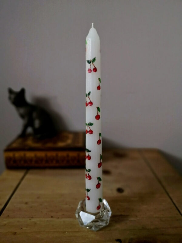 The one of 3 taper candles with cherry pattern.